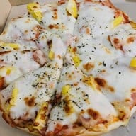 วีกฤษ พิซซ่าหน้าทะลัก หน้าตลาดเทศบาลเมืองชุมพร