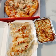 เมนูของร้าน ร้านพิซซ่า I am pizza สาขา โลตัส โก เฟรช ปากซอยกันตนา ซุ้มสีดำแดง