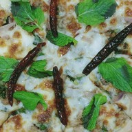 พิซซ่าแป้งสด โลตัสเอ็กซ์เพ็รสศาลากลางหน้าหมู่บ้านคณาสิริ