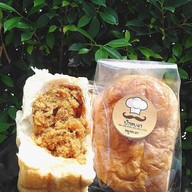 เมนูของร้าน ปังหยอง ขนมปังไส้ทะลัก สันทราย
