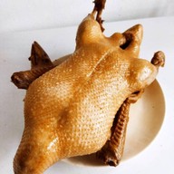 ไก่ย่างแดงและเครื่องดื่ม นนทบุรี