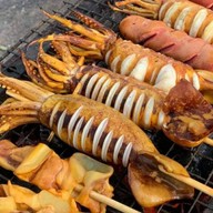 แม่อารีหมึกย่าง