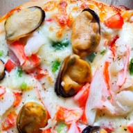 พิซซ่าไทย ข้างโรงเรียนอนุบาลแห่งที่ 1