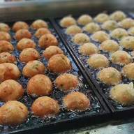 ทาโกะยากิ อัญอาร์ตโอ๊ต ตลาดพัฒนา