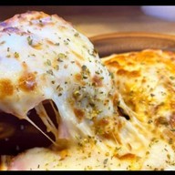 พิซซ่าอร่อย การนั่งก้อม หนองกระทิง