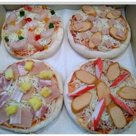 พิซซ่าอร่อย การนั่งก้อม หนองกระทิง