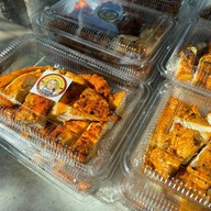 ไก่ย่างลุงหยอยเจ้าเก่า ตลาดหนองมน