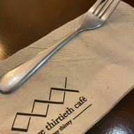before thirtieth café
