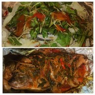 ปลาเผาฟอยล์ by ยักษ์เล่าเรื่อง .