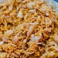 ก๋วยเตี๋ยวต้มยำไก่ฉีก โกลด์สน พัฒนาการ