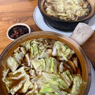 อ้วนบะกุ๊ดเต๋ ประชานิเวศน์