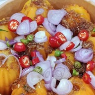 ร้านปลาหมึกย่างใบบัวหลังมอ