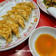 เมนูของร้าน Gyoza no Ohsho ตรงข้ามMega Donquite