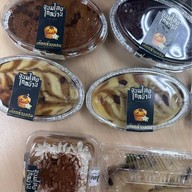 เมนูของร้าน ขนมไทยไกลบ้าน DC x Krispy Curry Puff - คาเฟ่ขนมไทย กะหรี่ปั๊บ เค้ก เครื่องดื่ม ศรีนครินทร์