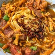 เมนูของร้าน ข้าวซอย ลุงประกิจกาดก้อม