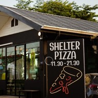 Shelter Pizza พิซซ่าเตาถ่าน เทพรักษ์-วัชรพล Shelter Pizza พิซซ่าเตาถ่าน เทพรักษ์-วัชรพล