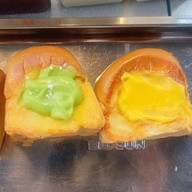 ปังปิ้ง เนยฉ่ำ ตลาดใหม่ไดโนเสาร์