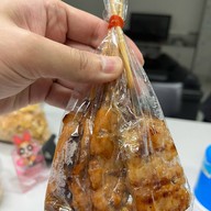 เมนูของร้าน TTT หมูทอดเสียบไม้ ท่าพระ