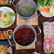 ร้านอาหารปิ้งย่างเหอ นวลจันทร์36  -