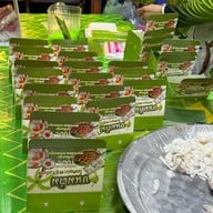 เมนูของร้าน ขนมต้มโคตรมะพร้าวอ่อน เจ้าดังวัดไร่ขิง นครปฐม