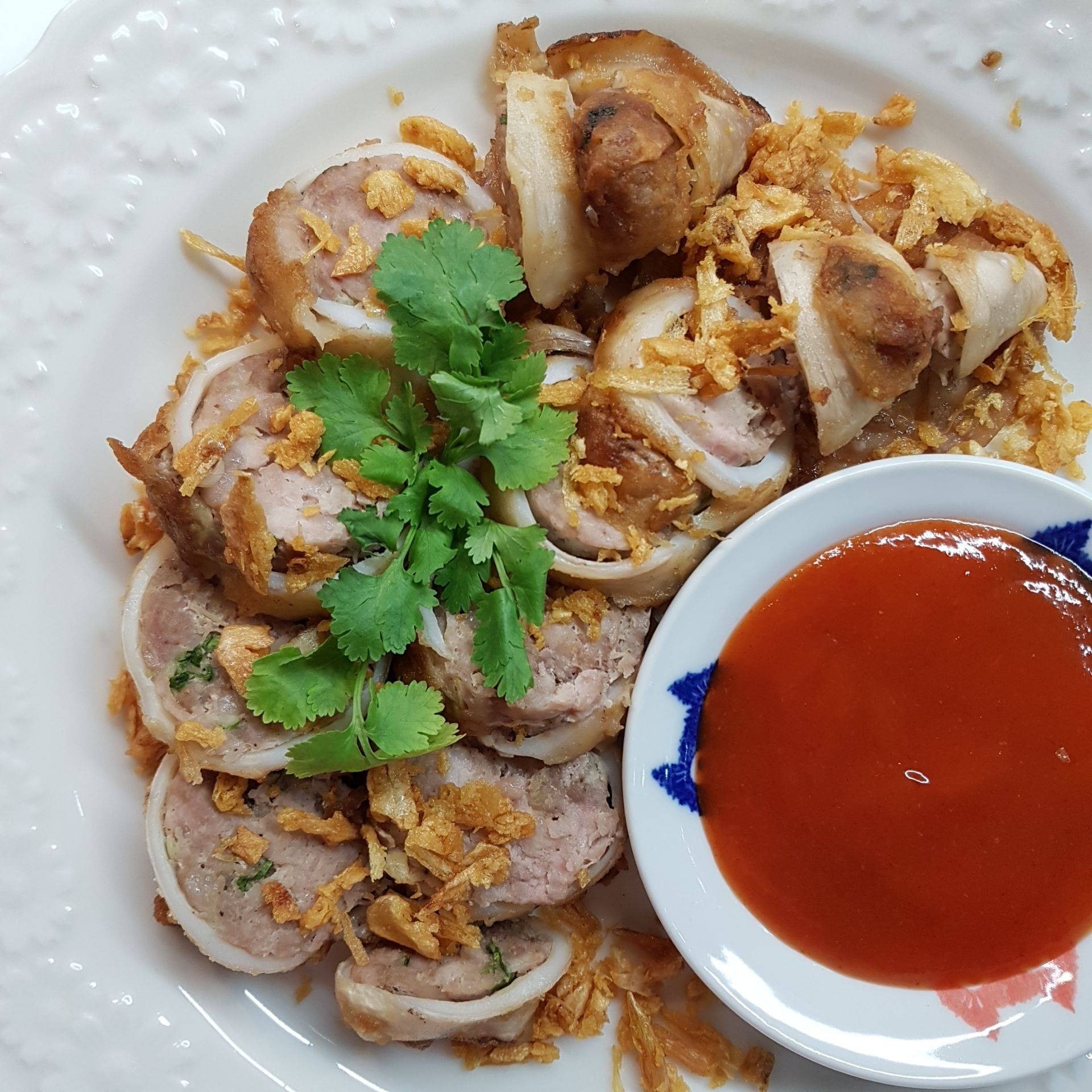 ปลาหมึกยัดไส้ทอดกระเทียมพริกไทย