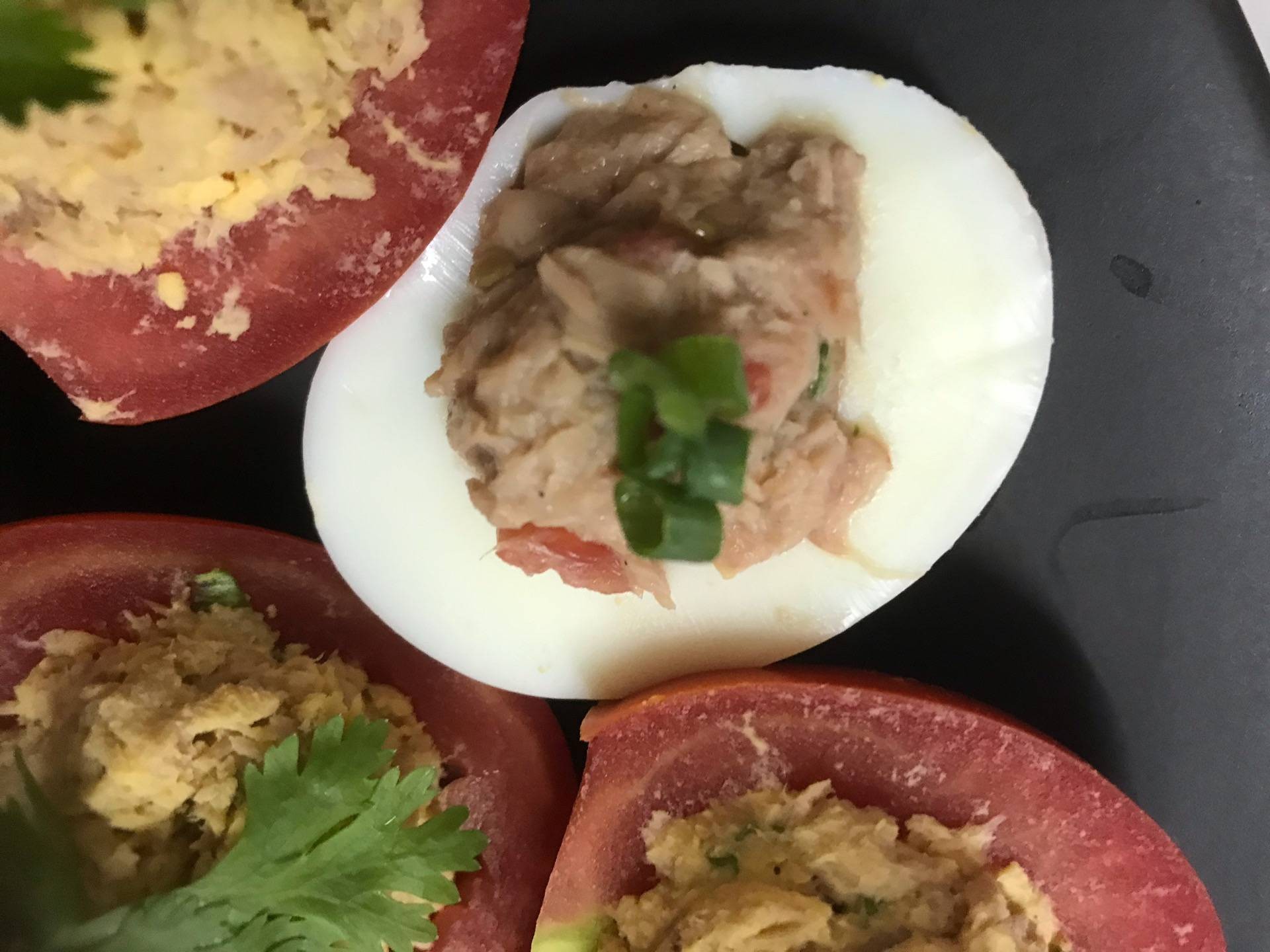Tuna salad in egg & tomato cup