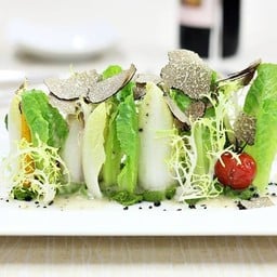 Seasonal salad with olive crumbs and garden cream