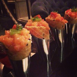 fresh salmon tartar ( salmon in waffle cone topped with spicy jelly) 