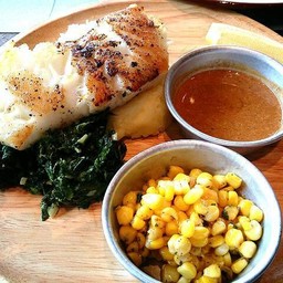 Grilled Chilean seabass, sauteed spinach, sweet corn and prawn sauce