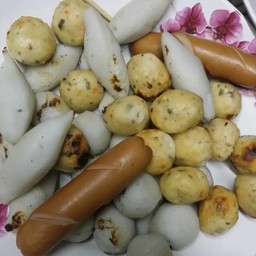 ร้านลุงเคราหมึกย่าง