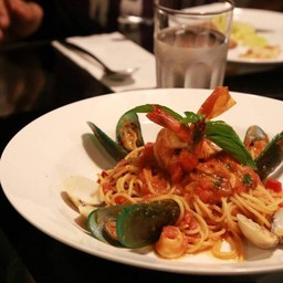 spaghetti tomato souce with seafood.