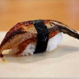 ข้าวปั้นปลาไหลย่าง