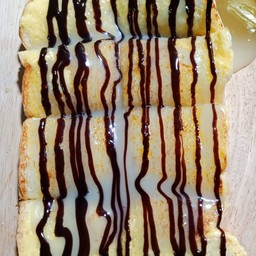 ปังปิ้งเนยนม ราดช๊อก