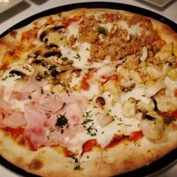Seafood, ham, mushroom and spicy Italian sausage Pizza