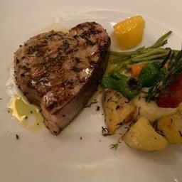 Grilled Mediterranean swordfish with olive oil and fresh herbs