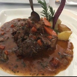 Ossobuco with vegetable gremolade and mashed potato