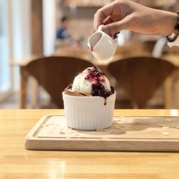 Bread Pudding with Mixed Berry Sauce.