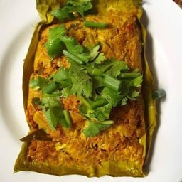 แอ๊บหมู (คลุกสมุนไพรห่อใบตองปิ้ง)