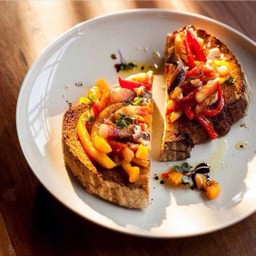 Bruschetta with anchovies, roasted capsicum and jamon ham
