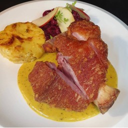 Pork leg with apple sauerkraut and scalloped potatoes