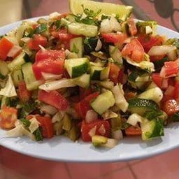 Salad Yemenite - with Cucumbers, Tomatoes , Cabbage, Coriander, Onion, Pickles, Olive Oil, salt and pepper [L2]