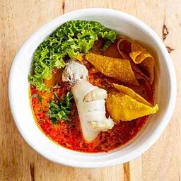 ก๋วยเตี๋ยวหมึกไส้ทะลัก ต้มยำน้ำข้น