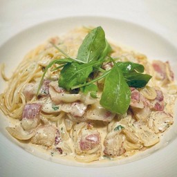 Spaghetti Carbonara  bacon & onion in cream sauce