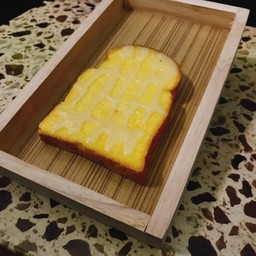 ขนมปังปิ้งเนยนม