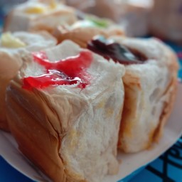 ร้านปังปิ้งไส้ทะลัก By โก๋โมทย์