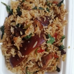 ข้าวผัดคลุก​กระ​เพรา​ขา​หมู​