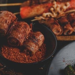 เบคอนพันไส้กรอก