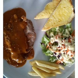 สเต็กหมูพริกไทยดำ