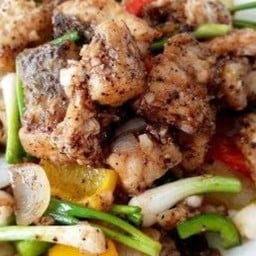 ผัดกระเทียมพริกไท (กับข้าว)