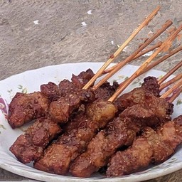 เนื้อย่างโคขุนโพนยางคำเสียบไม้